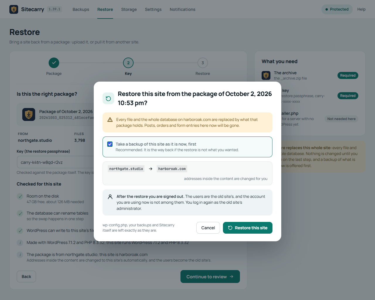 Sitecarry confirmation dialog before a restore: a backup of the site first, the old address changed to the new one, and the sign-out that follows
